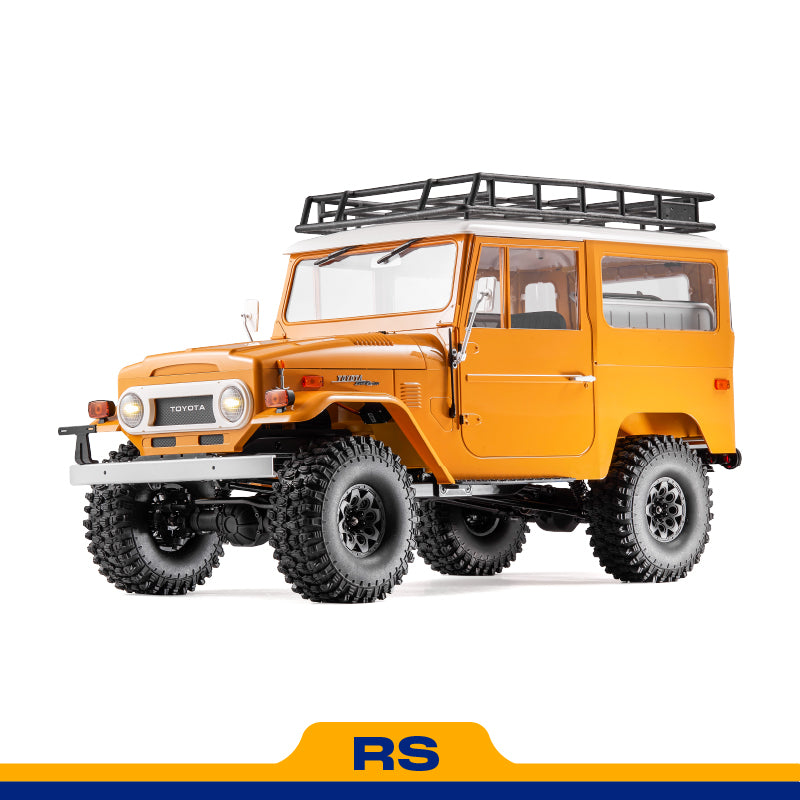 FMS 1:10 yellow Toyota Land Cruiser FJ40 RS RC rock crawler with roof rack and off-road tires.