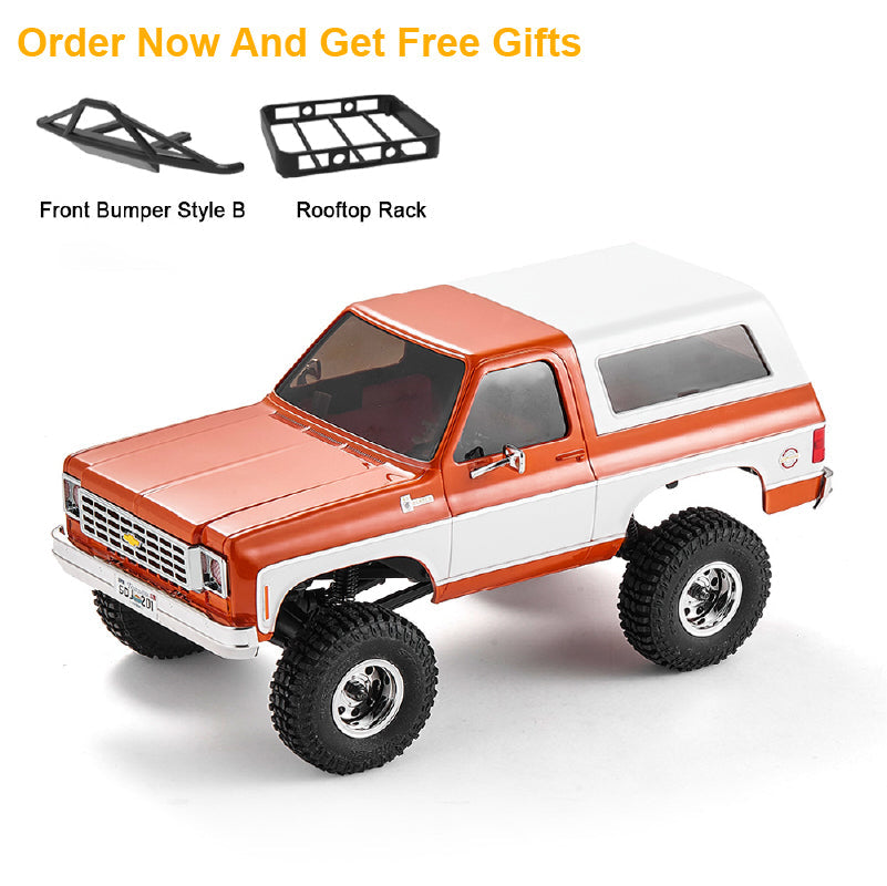 FMS 1:24 FCX24 Chevrolet K5 Blazer RTR in orange/white with optional bumper and rooftop rack