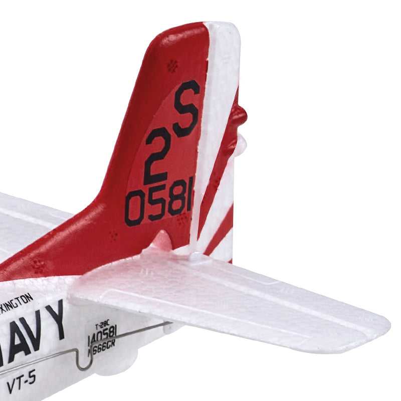 Close-up of a red and white airplane model with visible branding on a white background