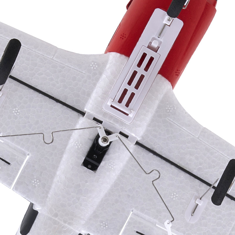 Close-up of a red and white circular saw on a white background