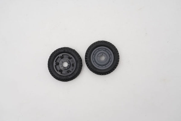 Assembled 1:12 Toyota FJ45 RC model wheels (2 pcs) with black tires.