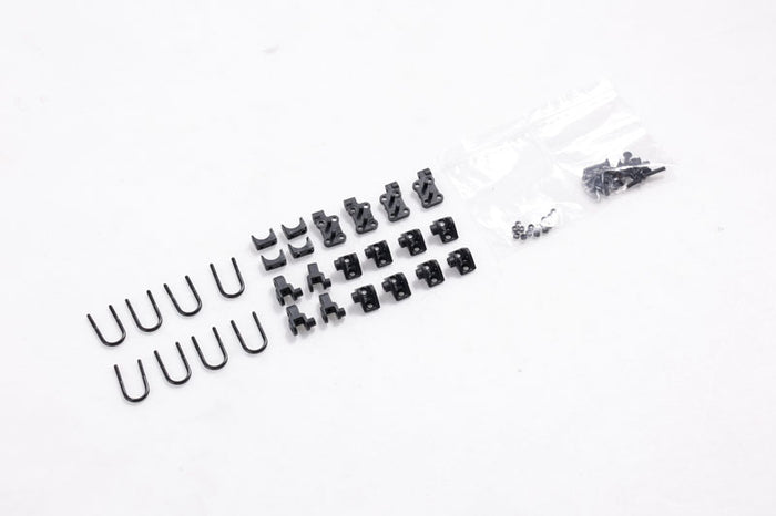 1:12 Toyota FJ45 shock mount parts including U-bolts and brackets.