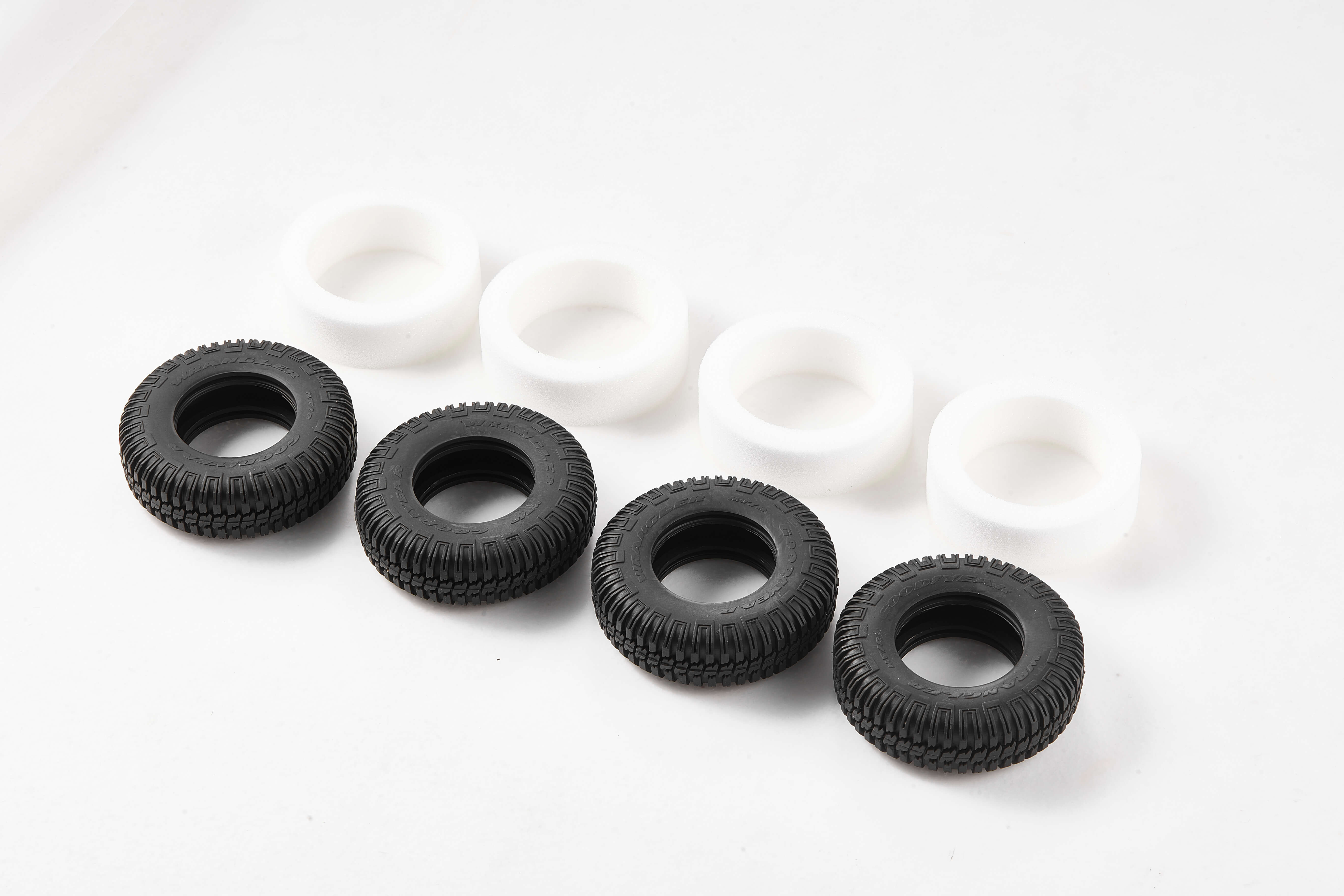 1:12 Hummer H1 tire set with foam inserts, black and white tires.