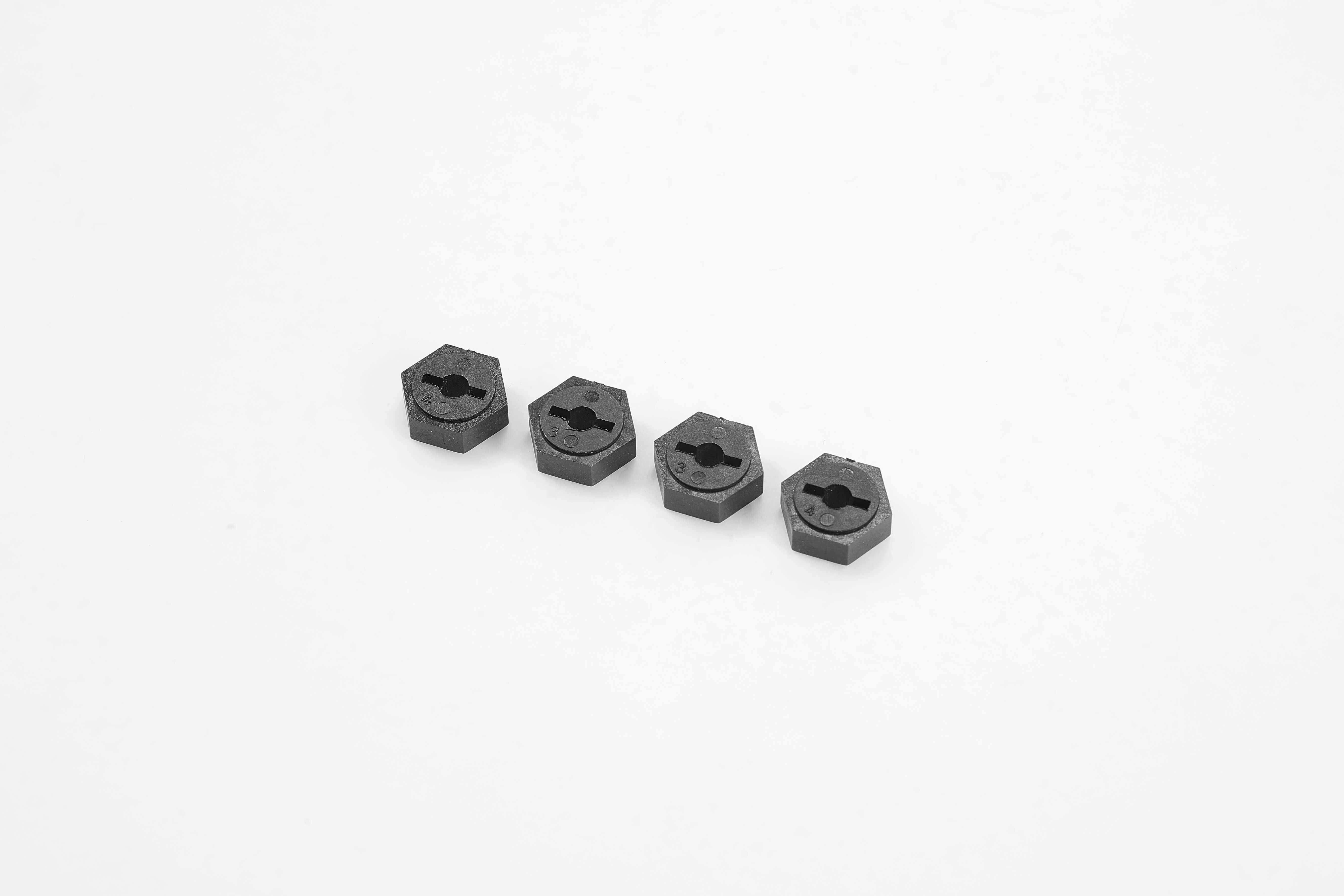 Set of four hexagonal black wheel adaptors for remote control vehicles
