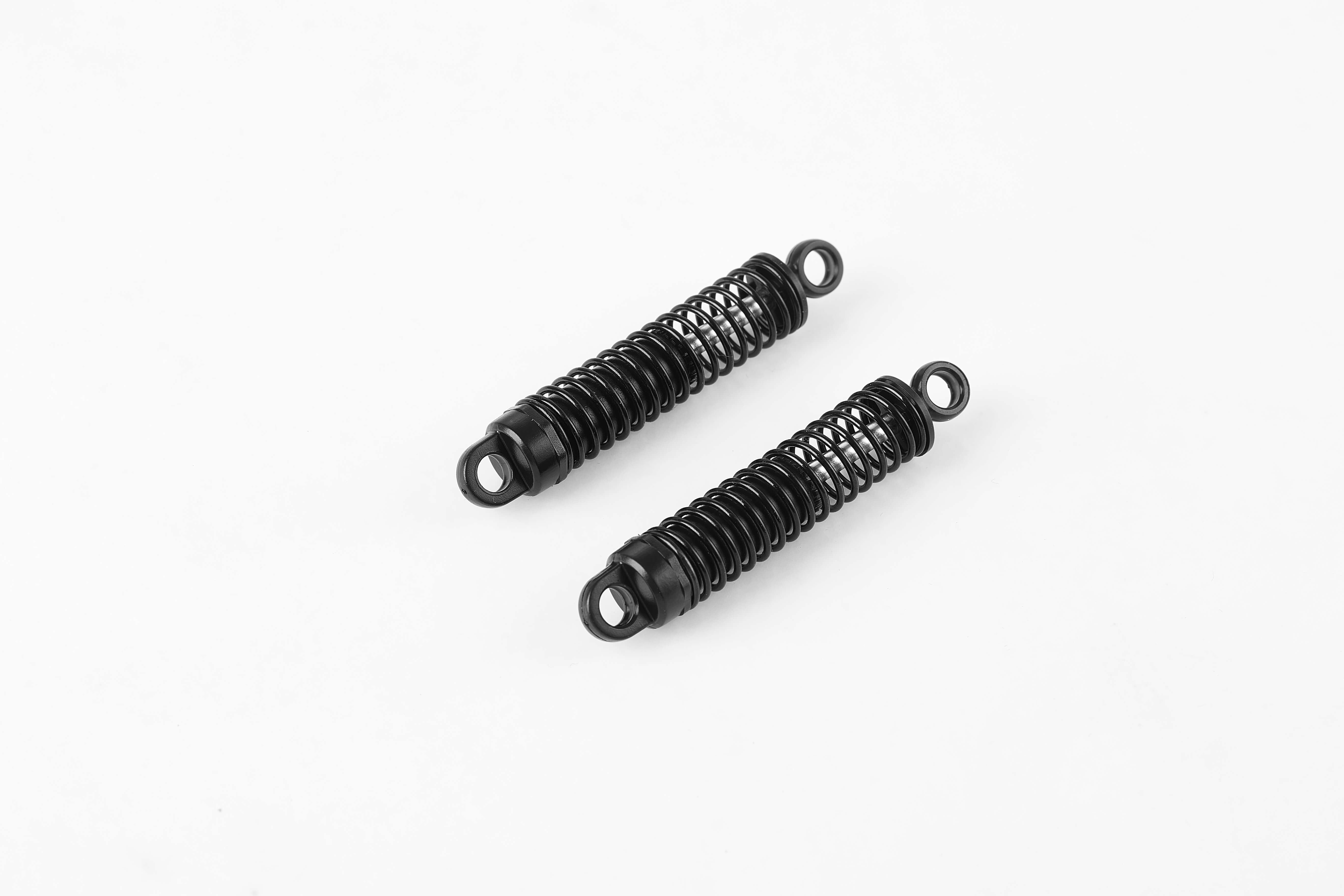 Front oil shock absorbers assembly for 1:10 Toyota FJ40 RC model.