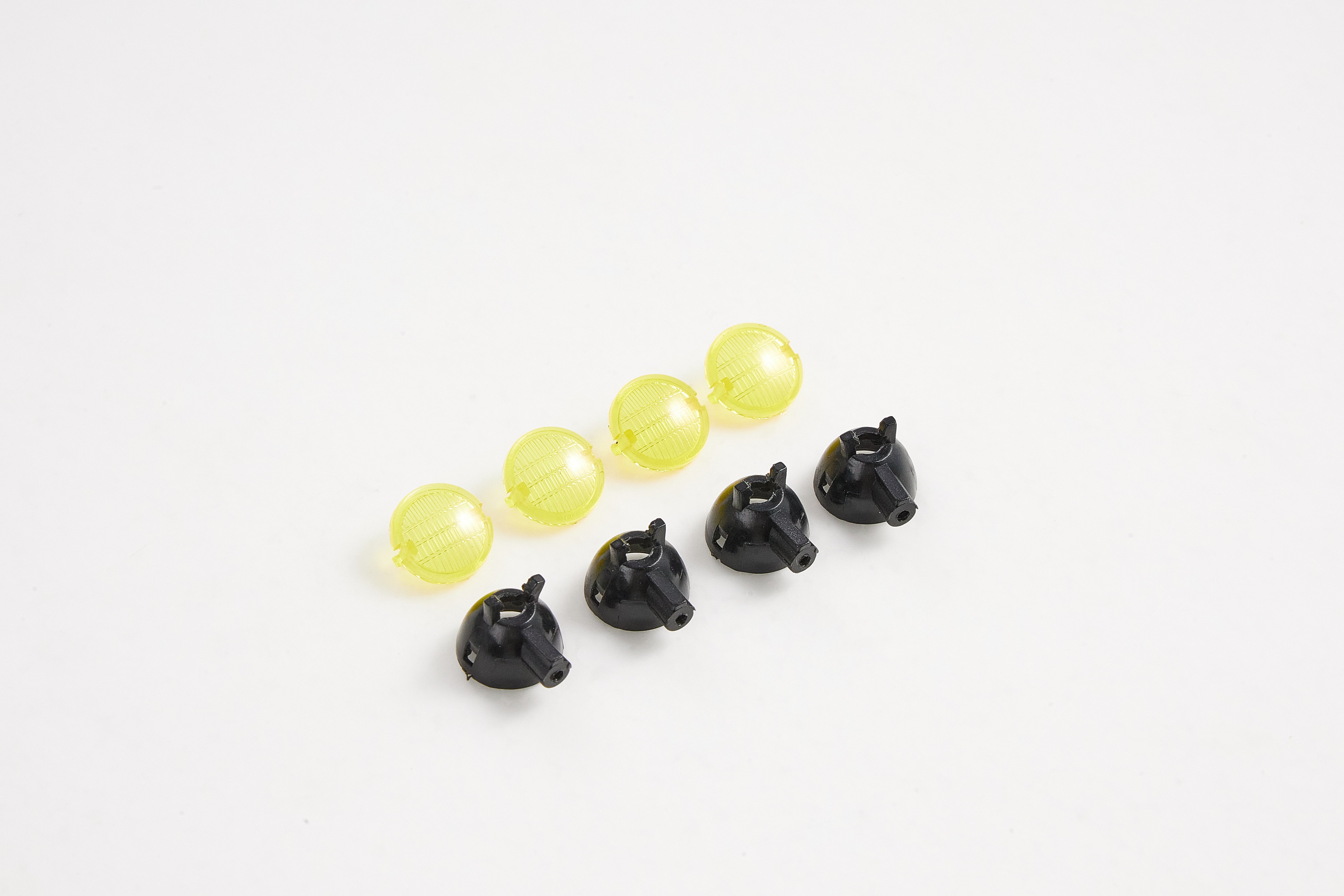 Spotlight Cup Set components for FCX18 Land Cruiser 80, yellow and black parts.