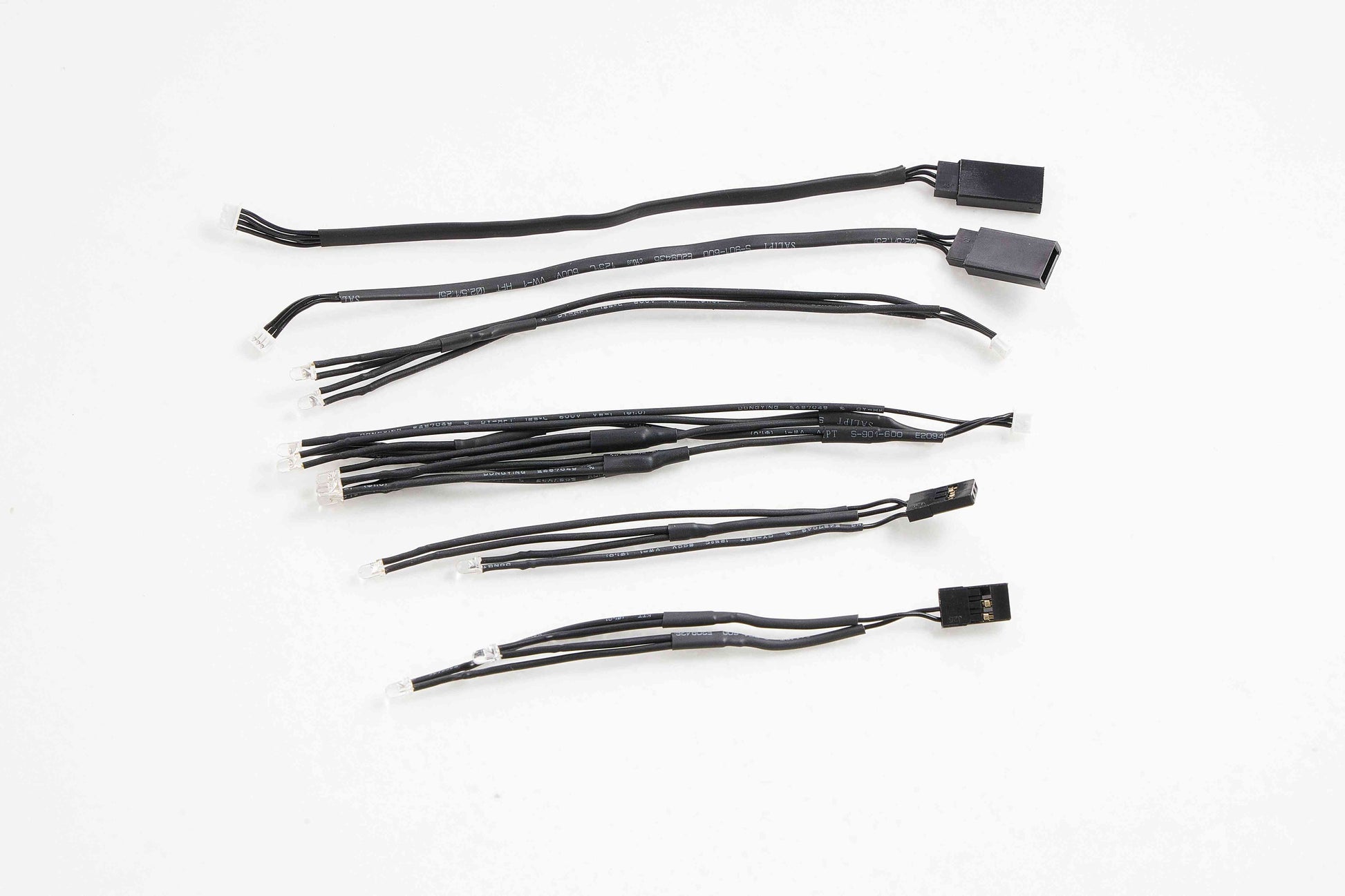 Assorted RC model connectors and cables for remote control vehicles