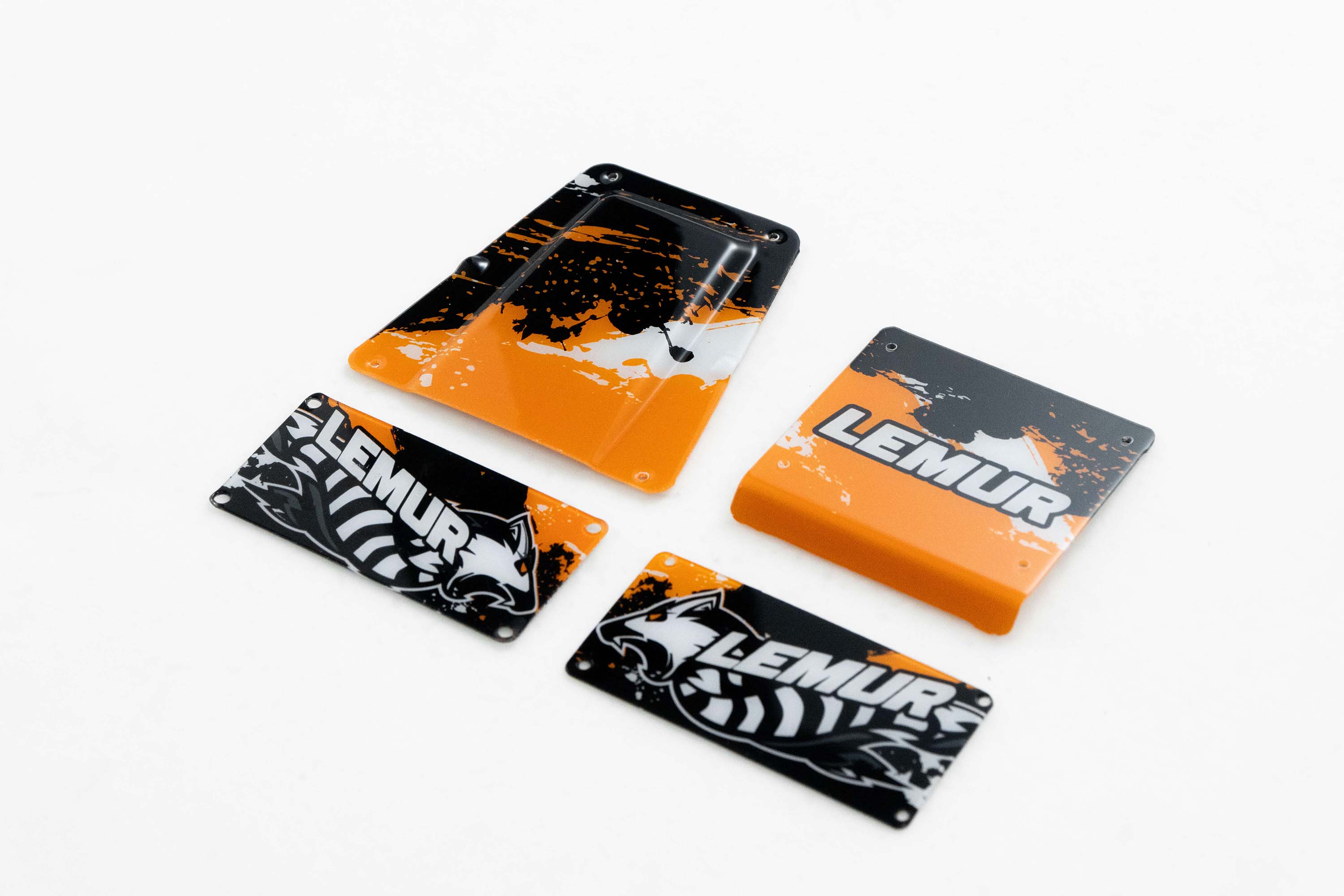 RC car Lemur body shell parts in orange and black graphics