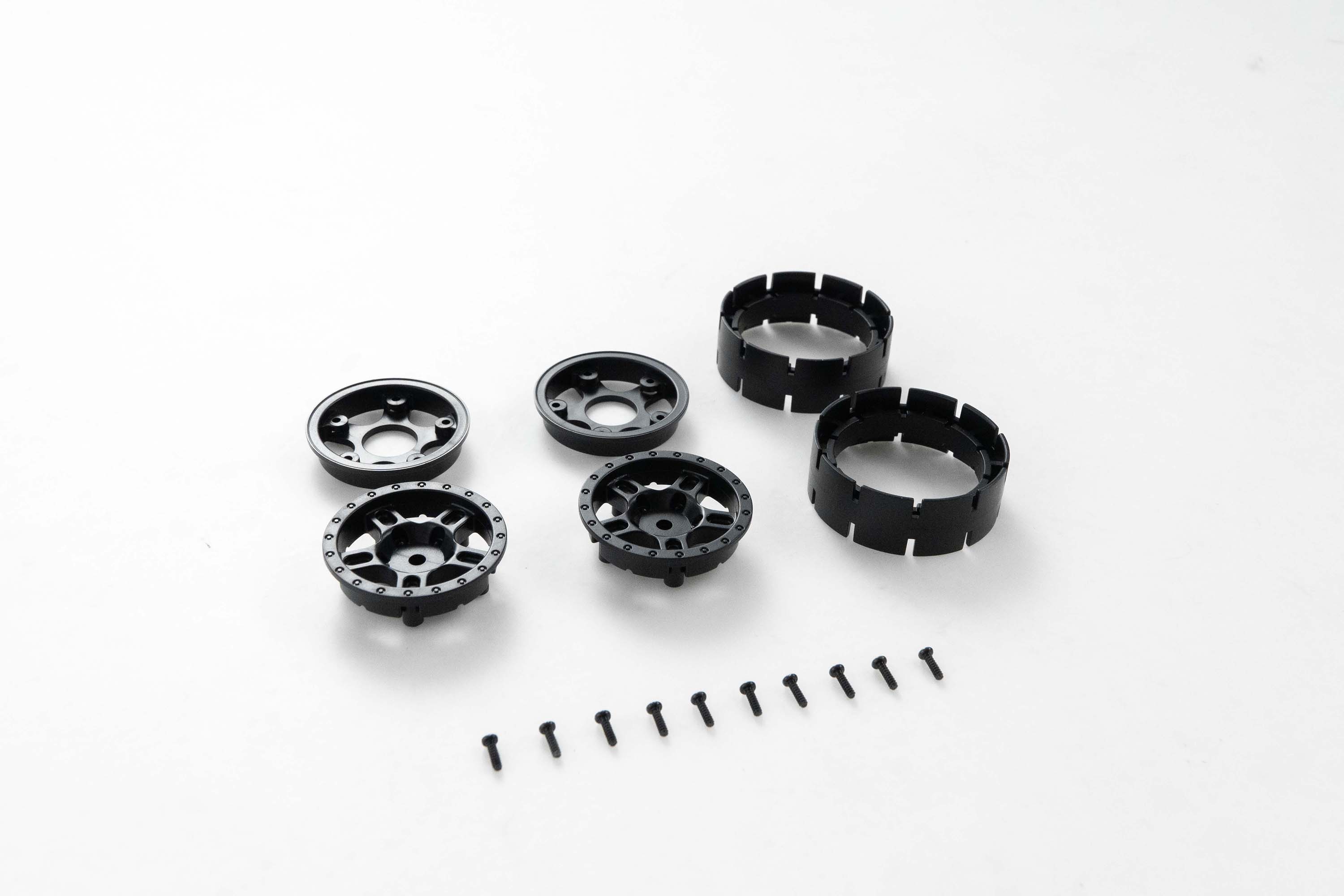 Black RC wheel parts set with screws for assembly