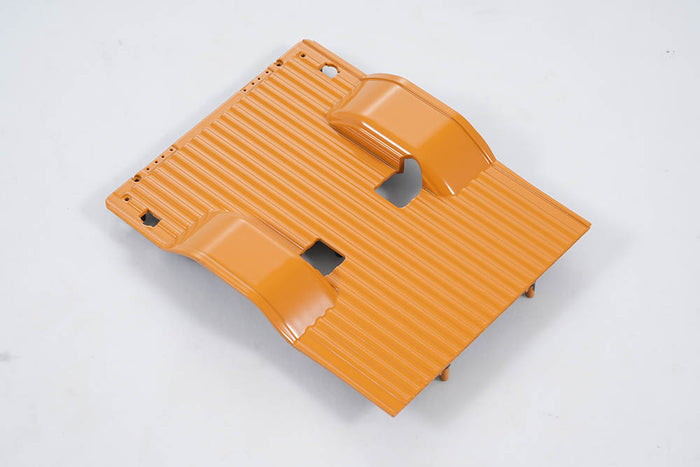 Orange FCX18 K10 chassis plate for remote control vehicle