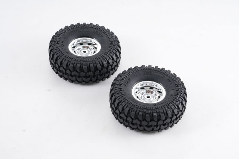 1:10 scale Chevrolet K5 Blazer wheel assembly, chrome rims with black tires.