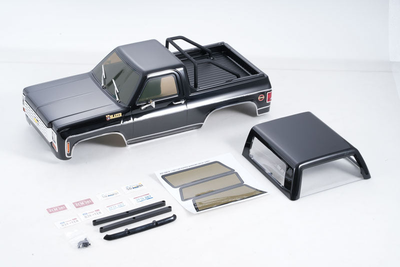 1:10 Chevrolet K5 Blazer painted body in brown, orange, black with additional parts.