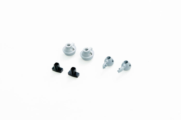 Gray and black RC model connectors and parts for 1:24 Unimog 421.