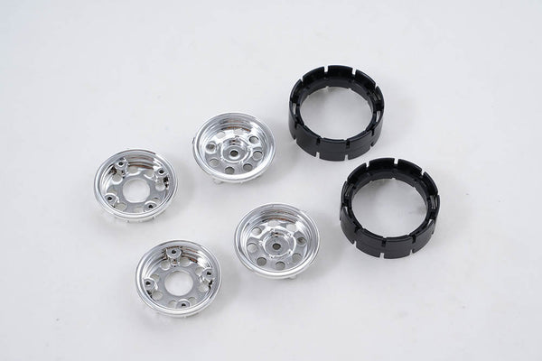 RC vehicle plastic wheel parts set in silver and black, suitable for custom builds.