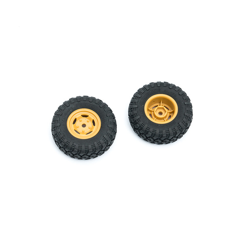 RC vehicle wheel assembly set with black tires and gold rims