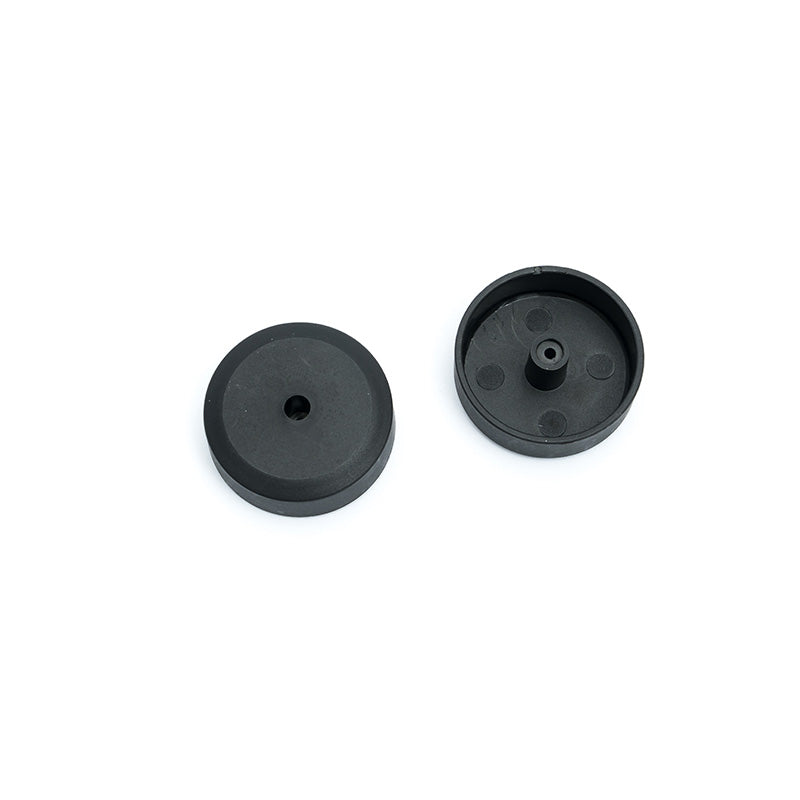 Black spare wheel trims for FCX24M Discovery RC vehicle