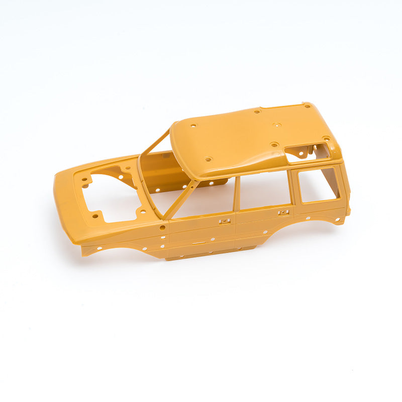 Yellow FCX24M Discovery RC car body shell for customization
