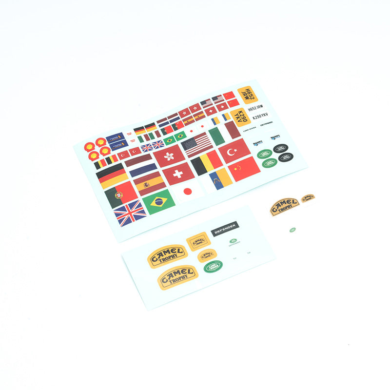 Decal sheet featuring various country flags and logos for RC models.