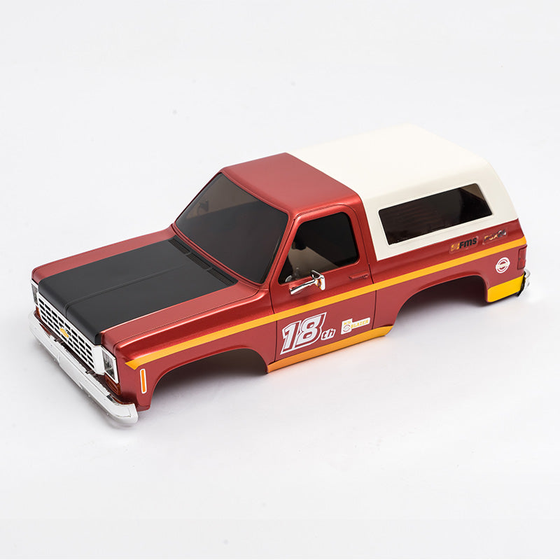 1:24 K5 PRO car body assembly painted red and cream with sporty details.