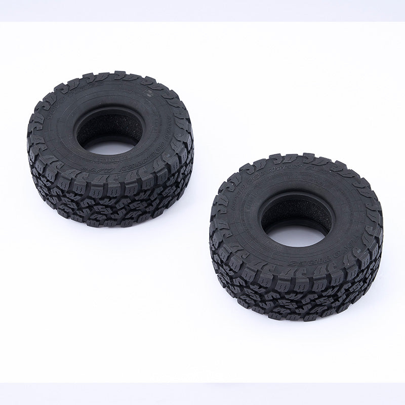 1.9' black RC vehicle tires with detailed tread patterns.