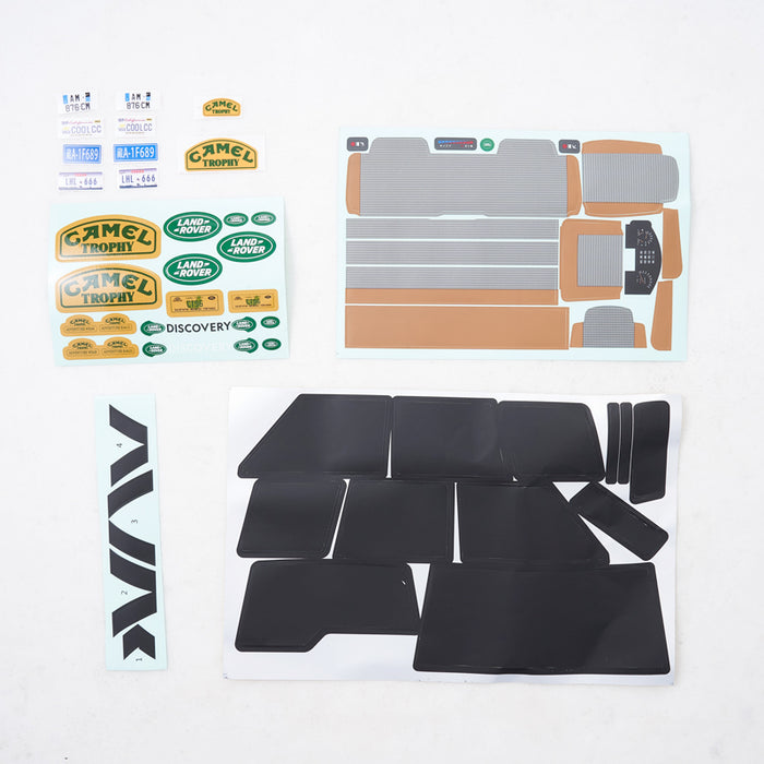 FCX10 Discovery decal sheet set with Camel Trophy, Land Rover graphics, license plates, and model parts.