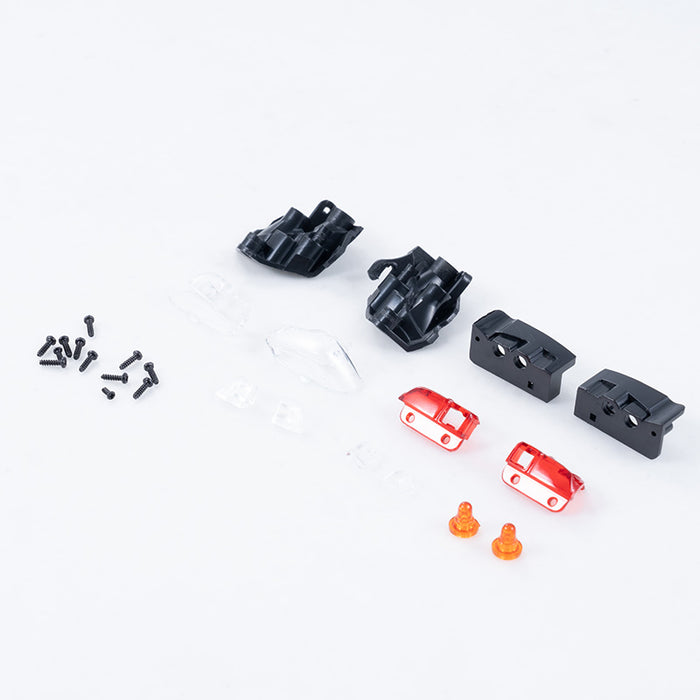 1:24 Tacoma light cup set components: black housings, clear lenses, red/orange lights.