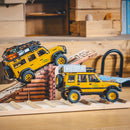 FMS 1:24 FCX24M Land Rover Camel Trophy Edition RTR on a wooden ramp