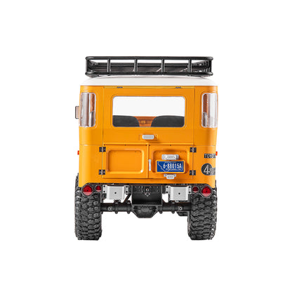 FMS 1:10 Yellow Toyota Land Cruiser FJ40 RS RC car rear view with roof rack and detailed interior