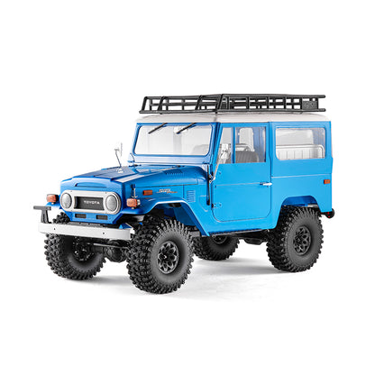 Blue FMS 1:10 Toyota Land Cruiser FJ40 RS RC rock crawler with roof rack and off-road tires