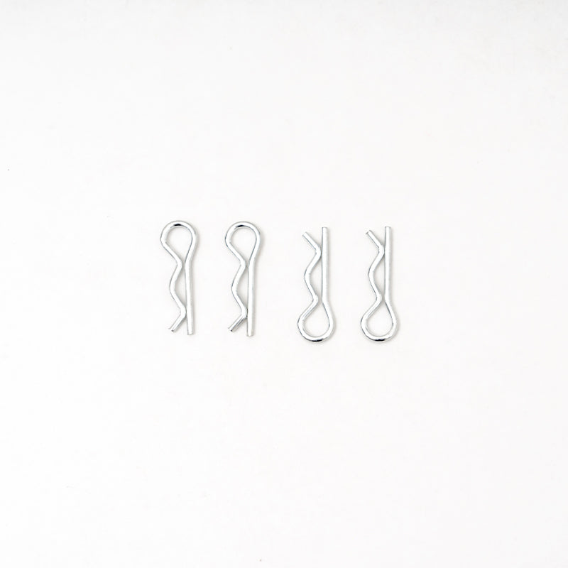 Set of four metal clevis pins for securing RC model parts.