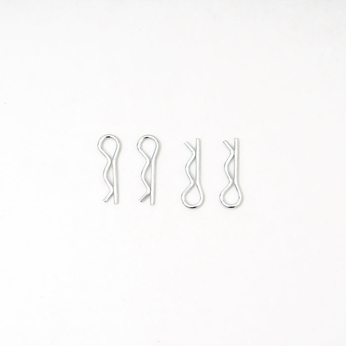 Set of four metal clevis pins for securing RC model parts.
