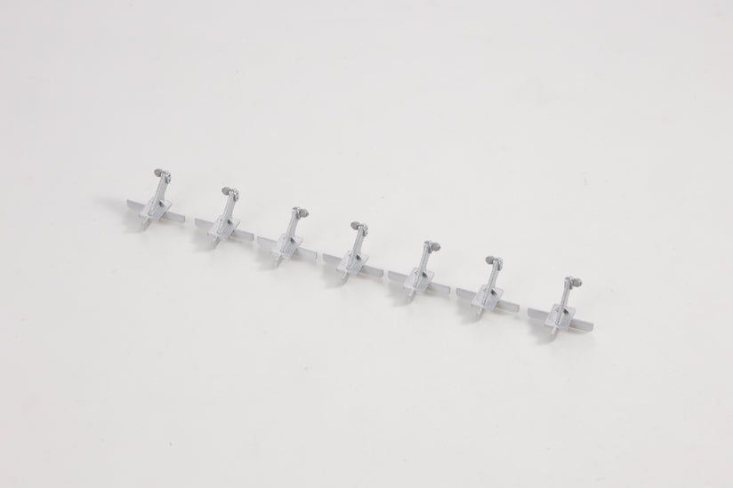 Row of six gray control horns for RC models