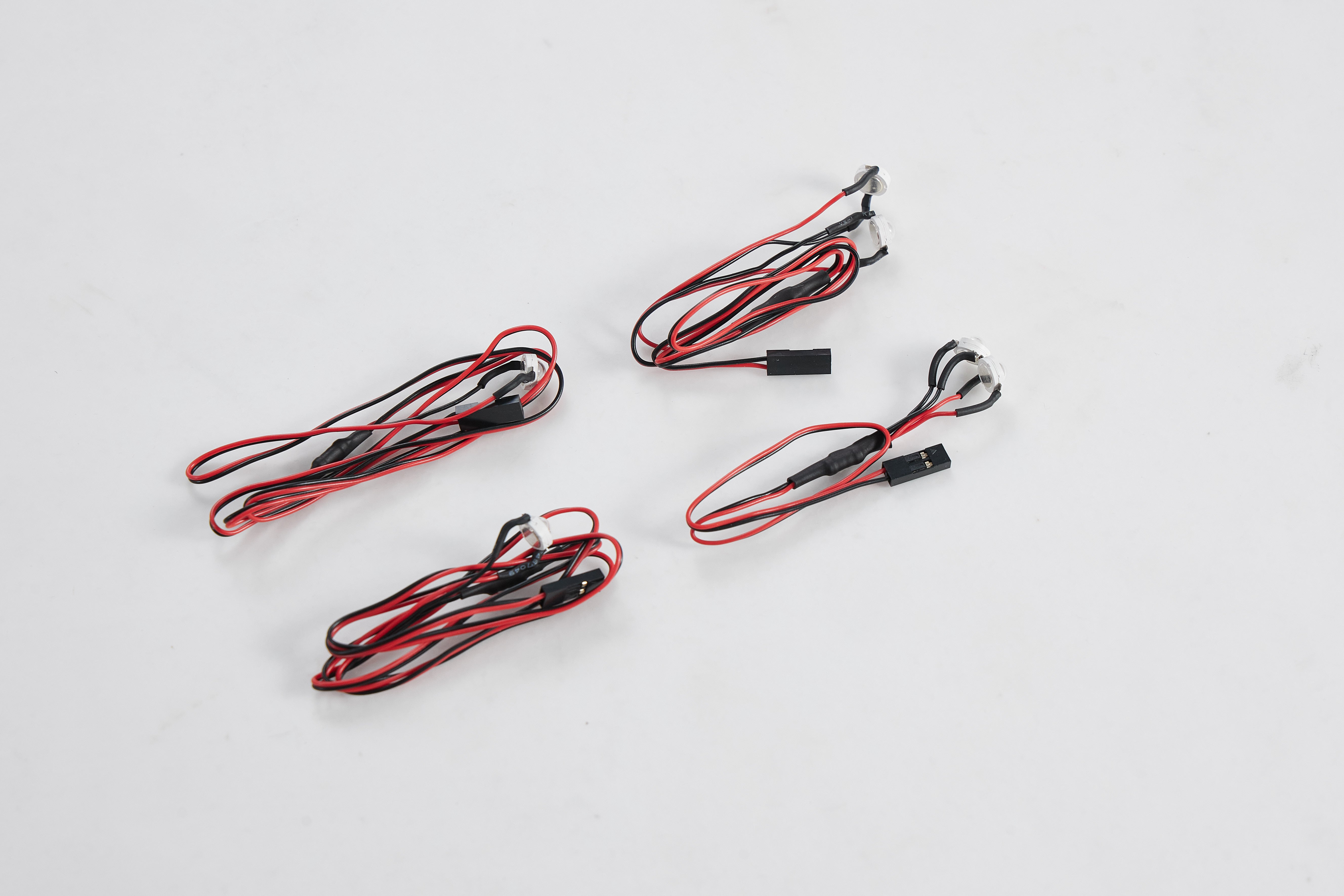 Red and black wiring connectors for remote control models.