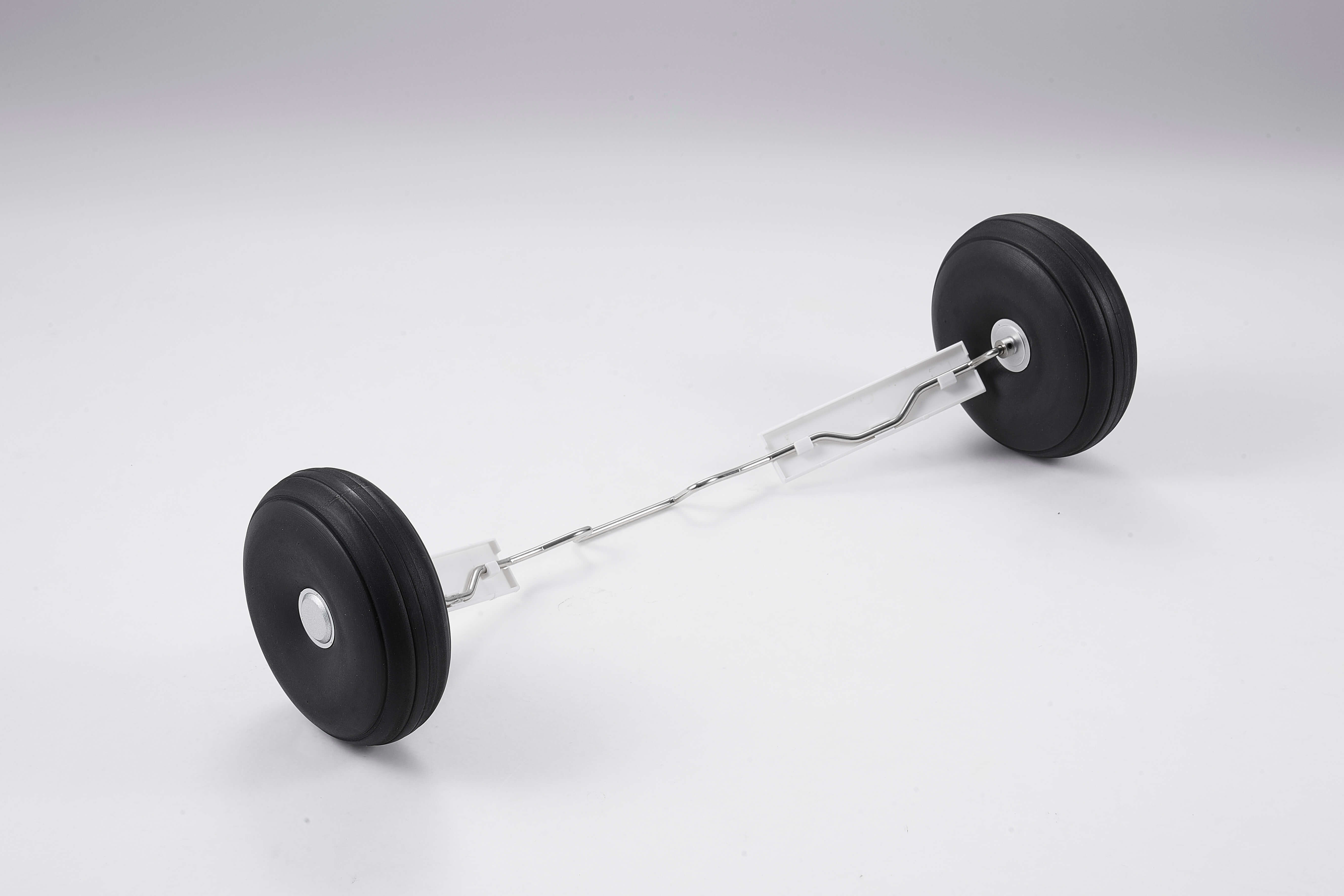 Barbell with black rubber plates for strength training and fitness.