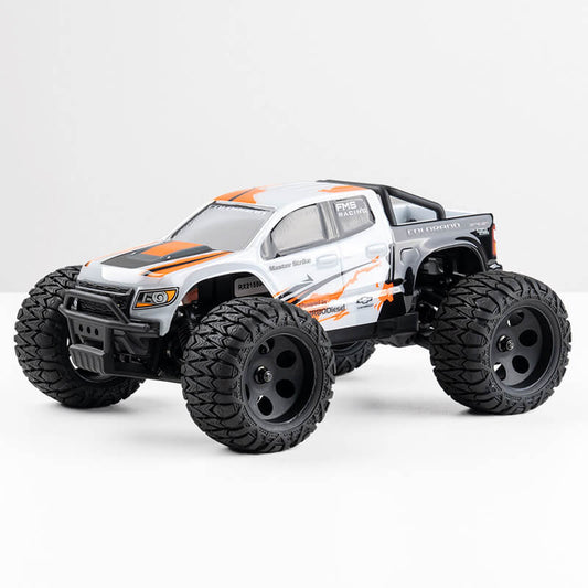 FMS 1:24 Chevrolet Colorado Monster Truck RTR in gray and orange with large wheels