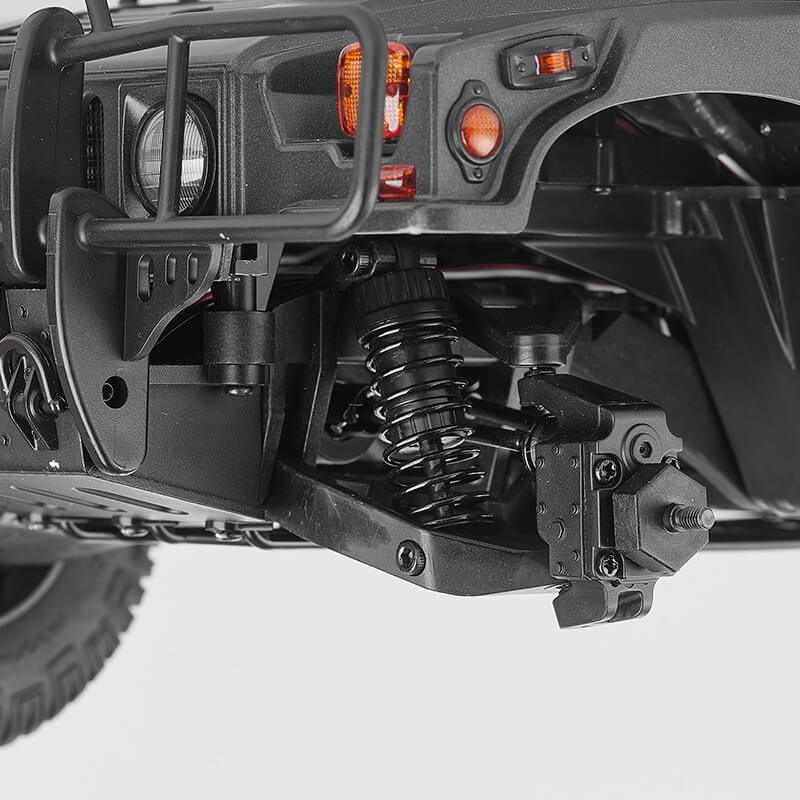 FMS 1:12 Hummer H1 front suspension with black coilover shock absorber and control arms.