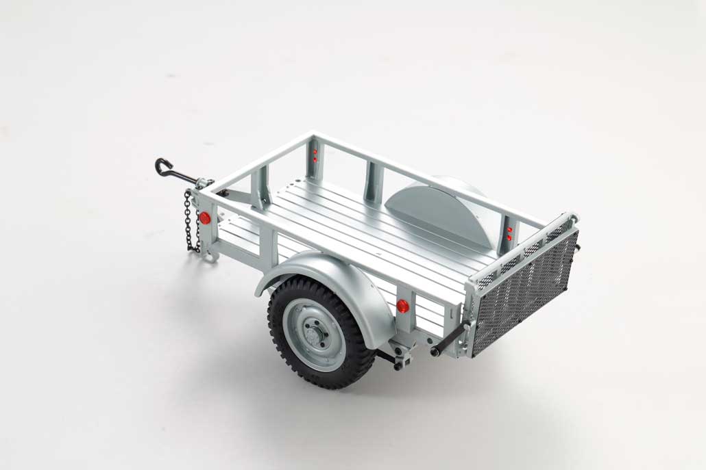 Silver FCX18 utility trailer with metal body and rugged tires for efficient hauling