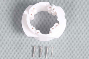 White motor board with screws for RC model aircraft parts.