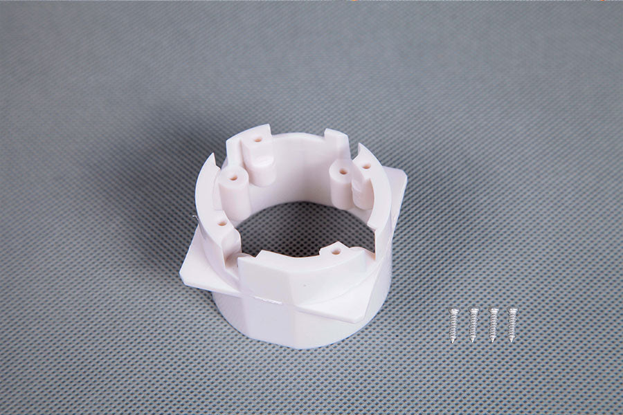 White motor board for RC models with mounting holes and four pins