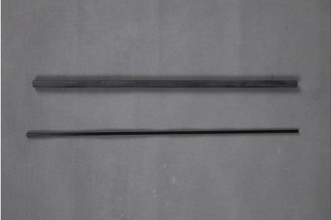 Two black MXS pipe components for RC models