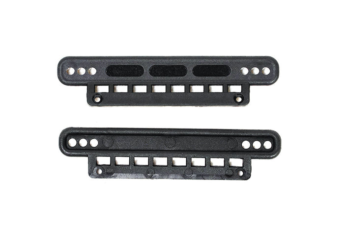Black RC vehicle chassis parts with multiple holes and slots