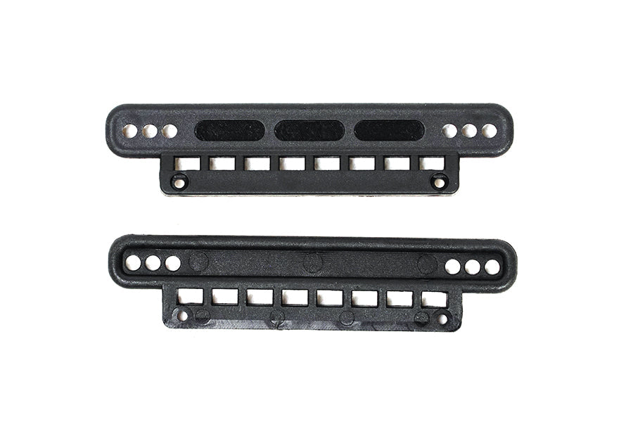 Black RC vehicle chassis parts with multiple holes and slots