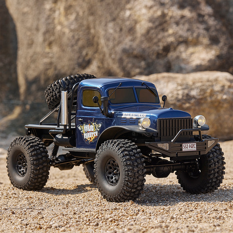 Blue ROCHOBBY 1:10 Atlas 4x4 Off-Road Truck RS with 'Mud Master' decal and spare tire mounted on the back.