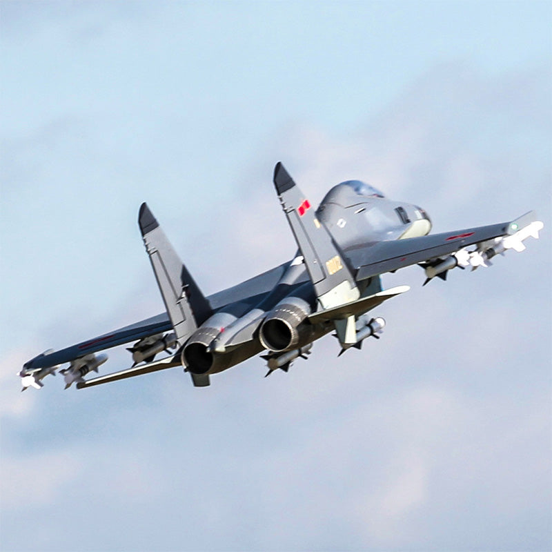 FMS Dual 70mm EDF SU-27/J-11 PNP jet with missiles in flight