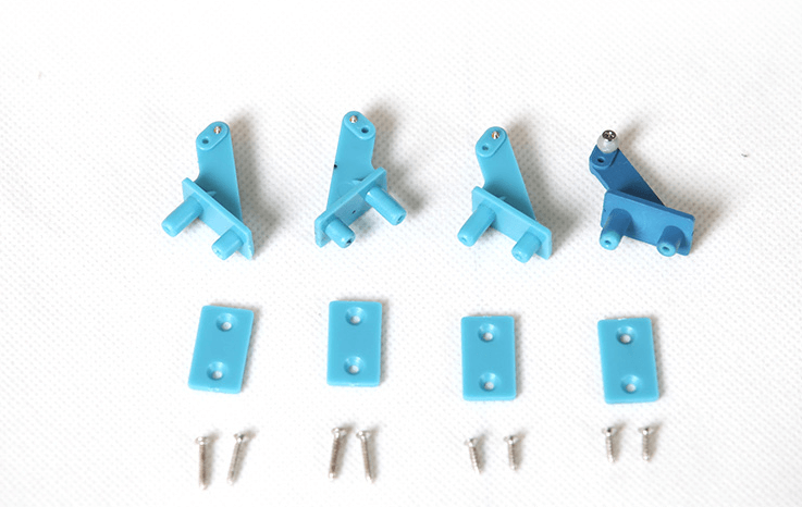 Blue control horns and screws for RC model airplanes
