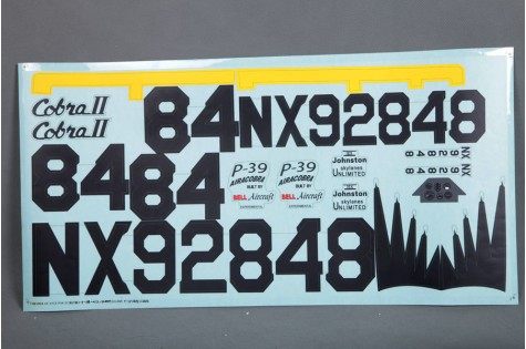 Decal sheet for 980mm P-39 model with numbers and aircraft markings.