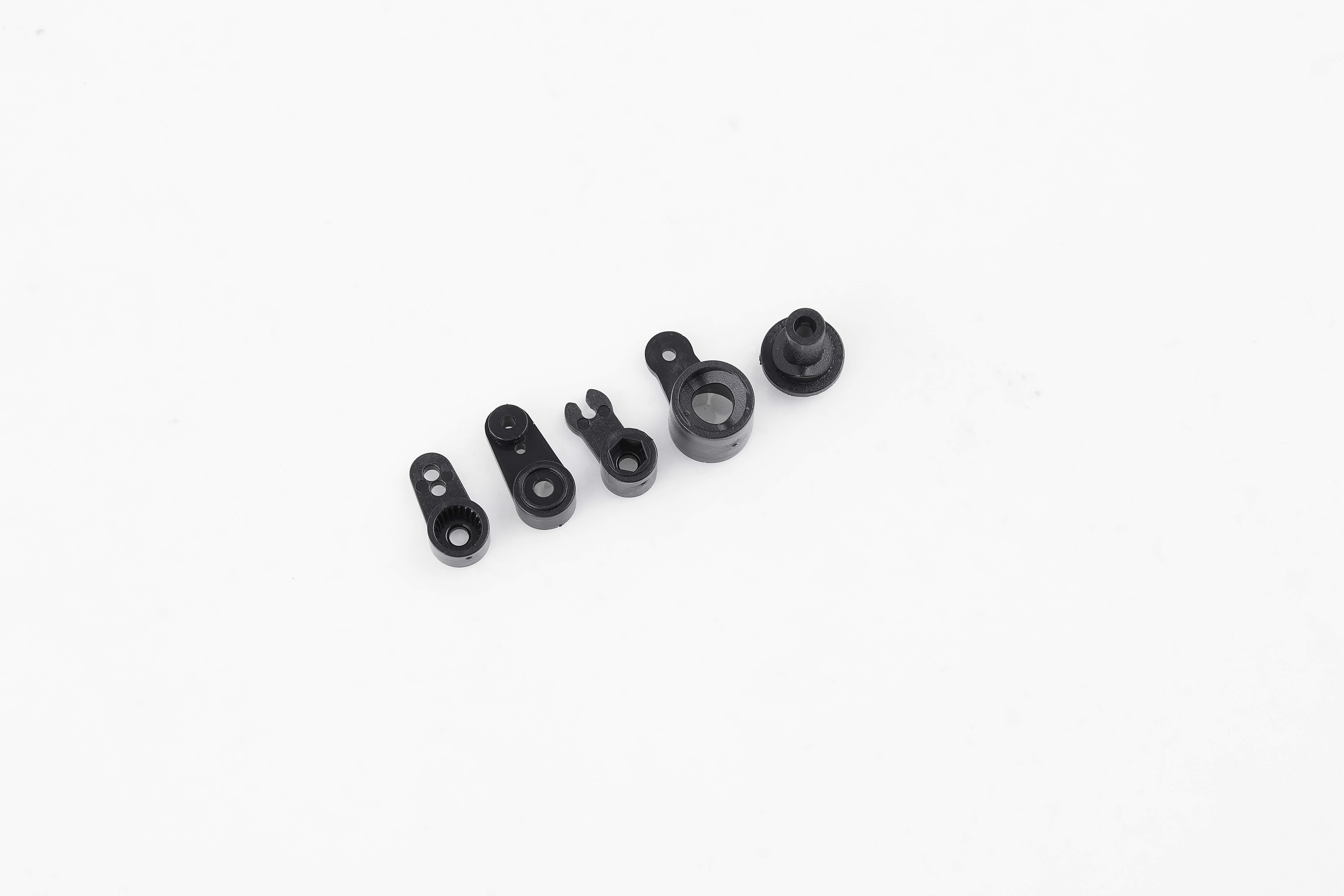 Various sizes of black servo horns set for RC models