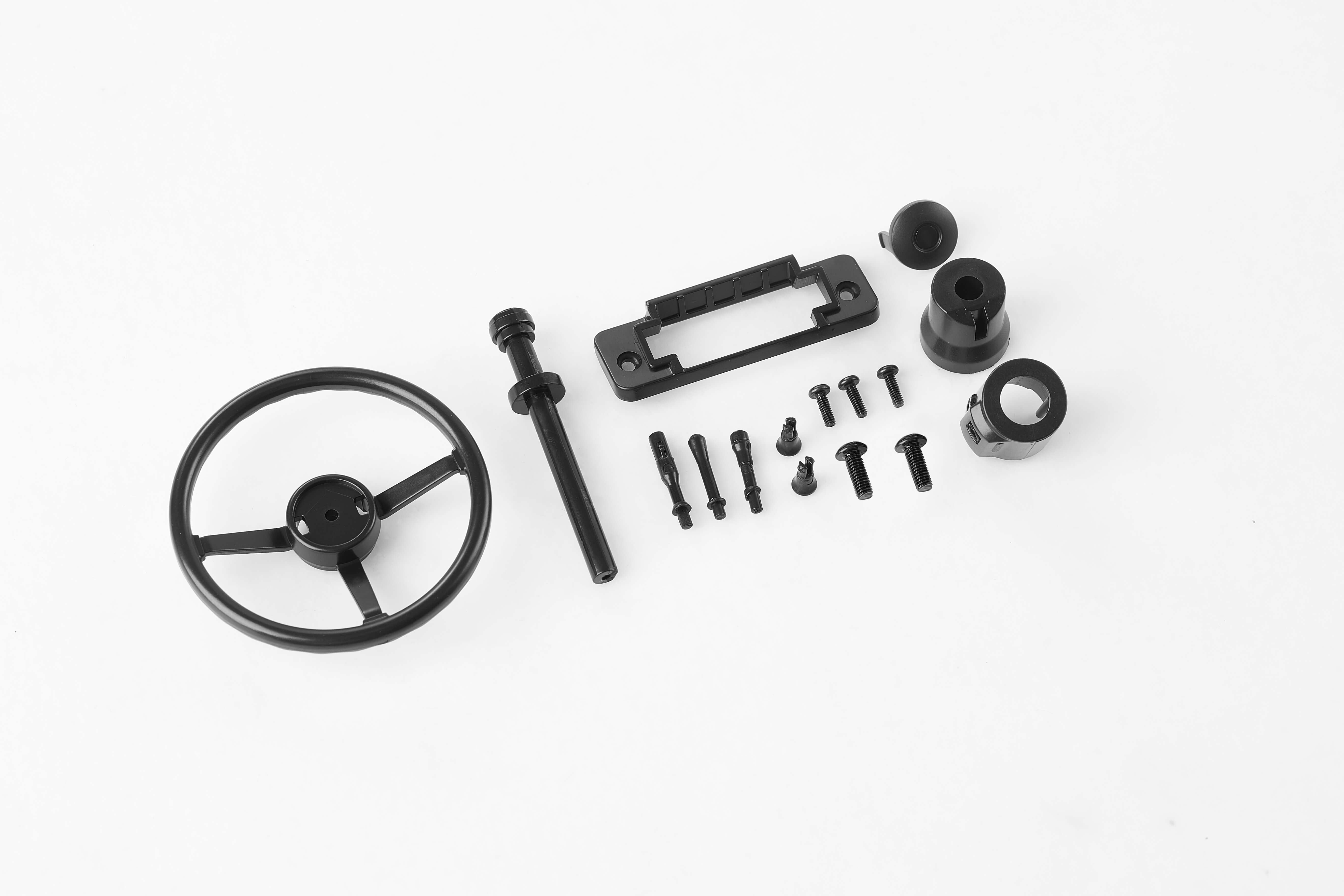 Black steering wheel set for RC models with screws and parts