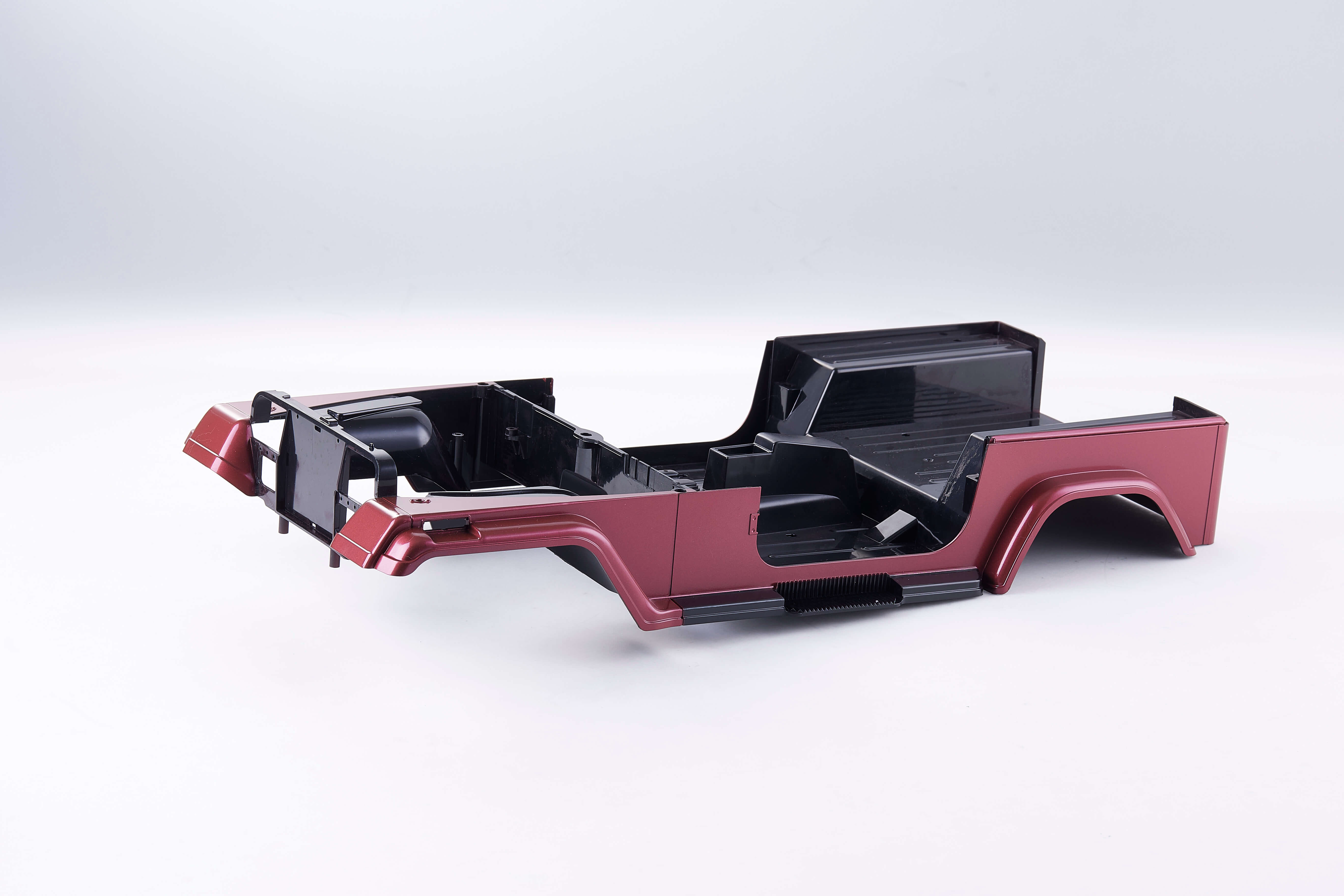 Red and black RC car chassis for 1:10 Mashigan model