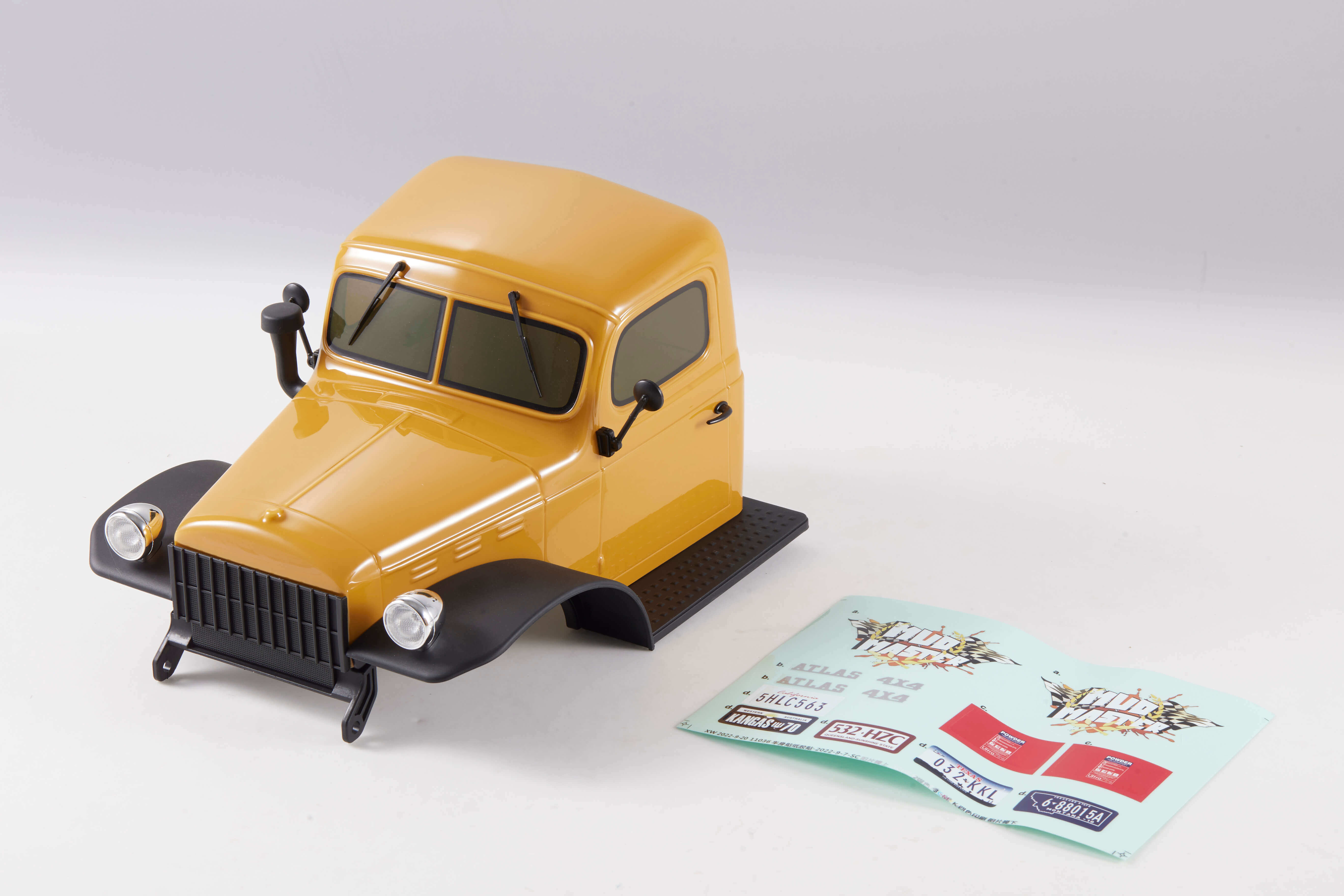 Yellow 1:10 Atlas 4x4 car body with decals and assembly guide